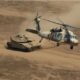 IDF Tank and helicopter. Credit: Nitsan Saddan