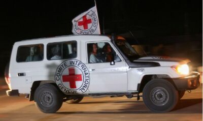 Red Cross vehicle driving Israeli hostages to the Israeli border, when being released. credit: Shay Saig’s FB page.